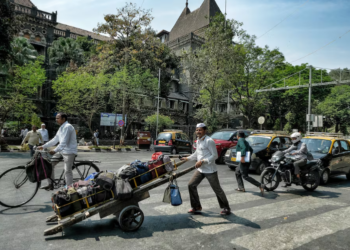 ‘Dabbawala’, un sistema casi infalible de reparto de comida que lleva un siglo alimentando Bombay
